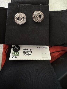 Authentic CHANEL Spring 2025 Silver Crystal CC Logo Stud Earrings
